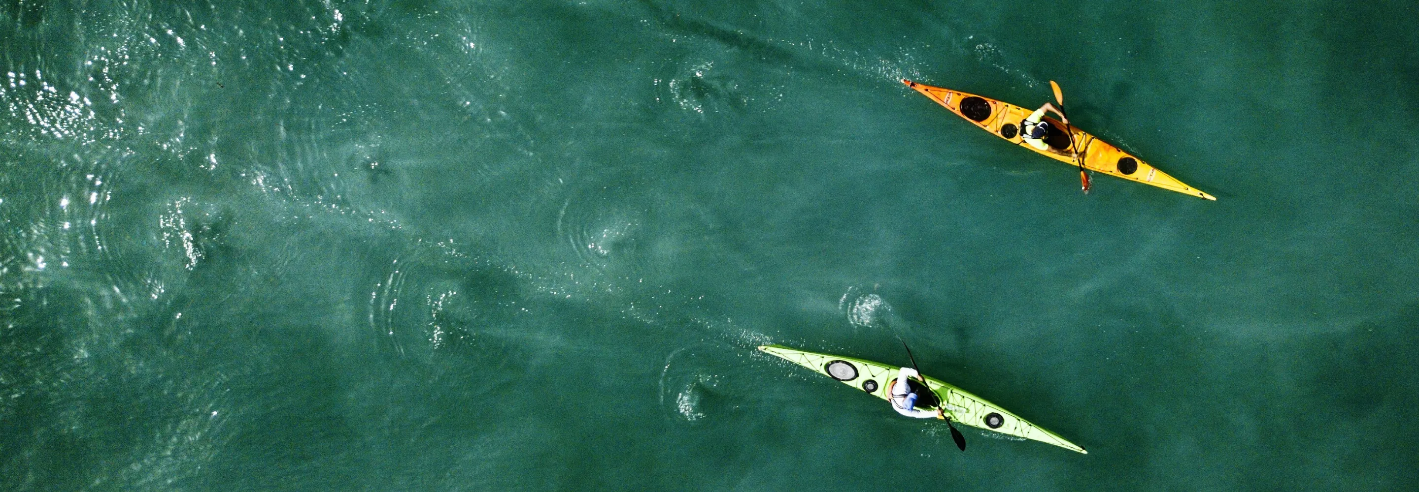 Arial view of two people kayaking